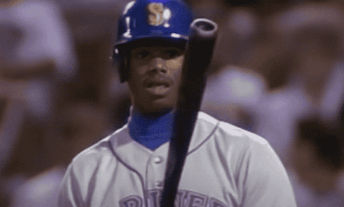 A nostalgic image showcasing Ken Griffey Sr. and Jr. together, highlighting their legacy in baseball.